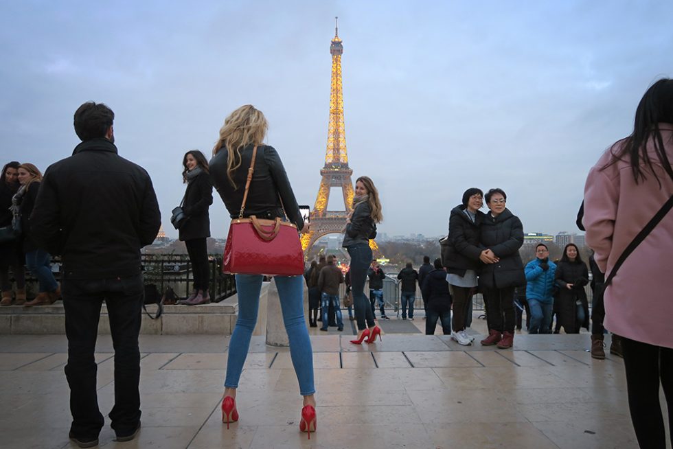 Girls taking pictures in Paris